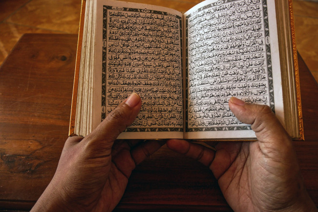 Ilustrasi baca al quran